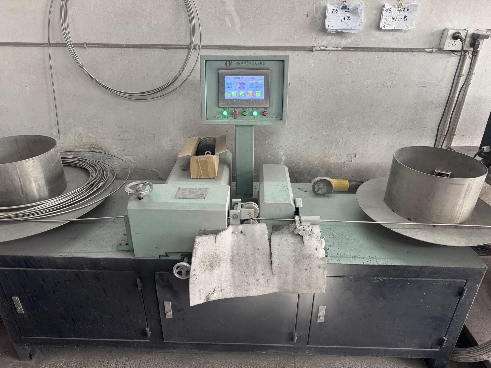 Armored cable measuring and cutting machine in operation on the Jiyuan production floor